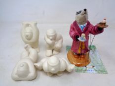 A Royal Doulton Wind in the WIllows figure 'Who is it this time?' together with four Goebel figures
