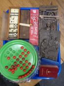 A tray of antique dominoes, solitaire board, glass bowl,