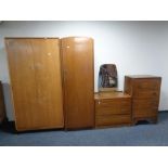 Four pieces of 20th century bedroom furniture : double door wardrobe, single door wardrobe,