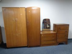 Four pieces of 20th century bedroom furniture : double door wardrobe, single door wardrobe,