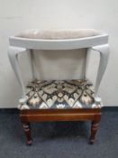 An antique mahogany stool together with a further painted dressing table stool