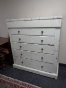 A painted antique pine six drawer chest