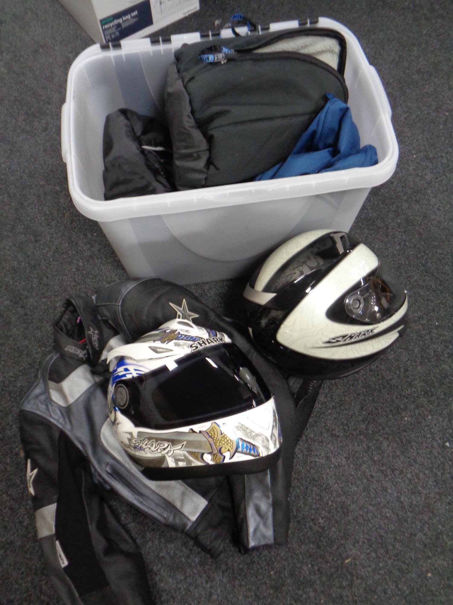 A box of motorcycle equipment,