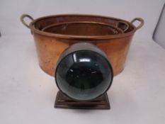 Two copper cooking pots and a reproduction mantel clock