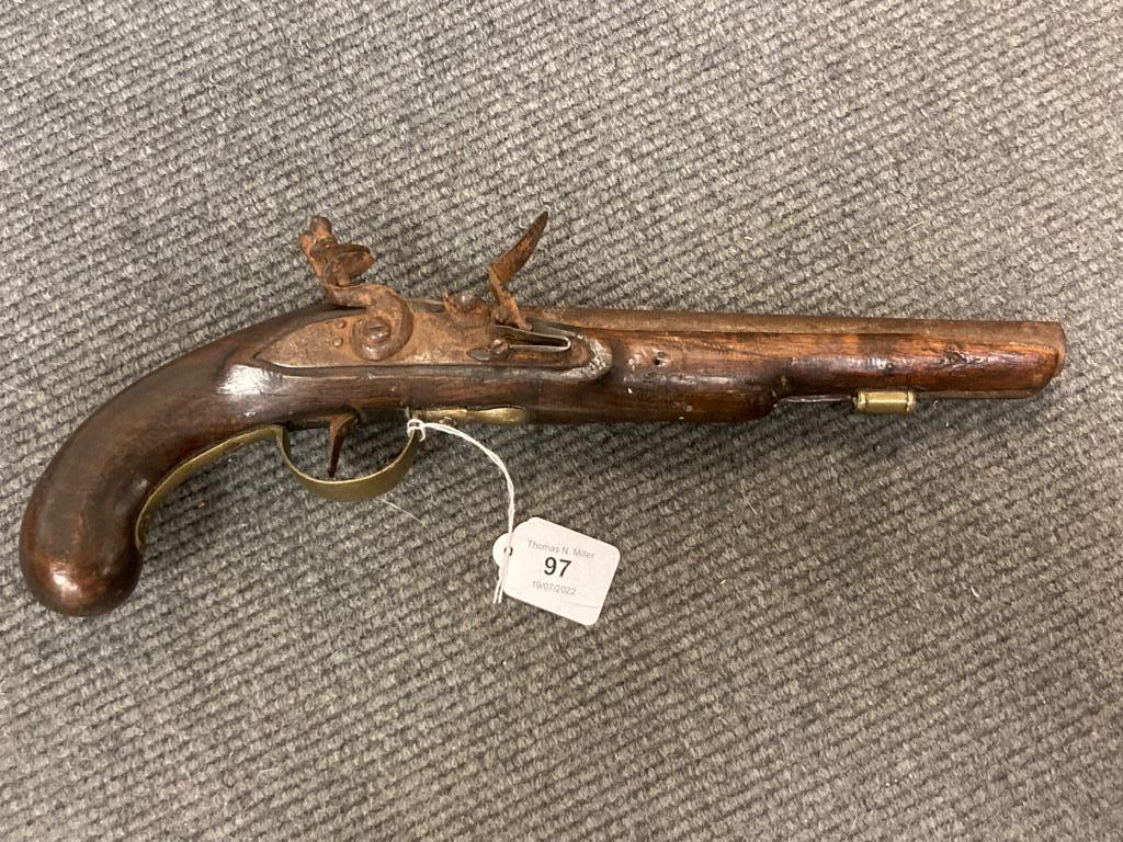 An ornamental flintlock pistol