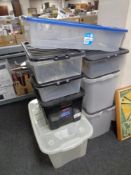 Eight plastic storage crates with lids