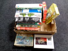 A box of approximately 10 mostly 1:35 scale military modelling kits including Italeri,