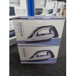 Two boxed Simbr steam irons