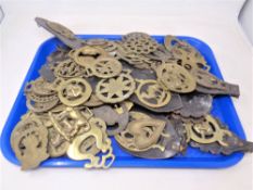 A tray of horse brasses,