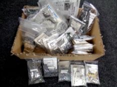 A box of unboxed 1:72 scale modelling kits, including AH-64 Apache helicopter,