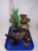 A tray of five various oil lamp bases and antique blow lamp