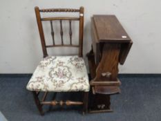 An antique beech rush seated kitchen chair and two oak occasional tables