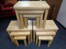 Three nests of three pine tables