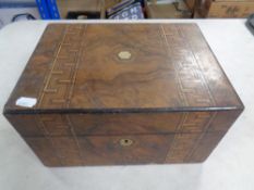 A Victorian walnut marquetry inlaid sewing box
