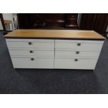 A mid 20th century two-tone six drawer chest with matching five-drawer chest and pair of