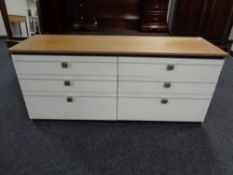 A mid 20th century two-tone six drawer chest with matching five-drawer chest and pair of