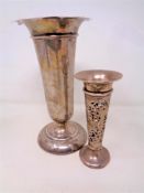 Two loaded silver bud vases