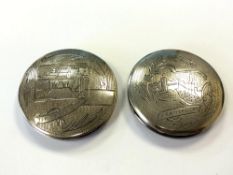 An Arabic silver compact marked Jerusalem and another marked Bethlehem