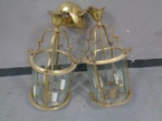 A pair of brass lantern lights