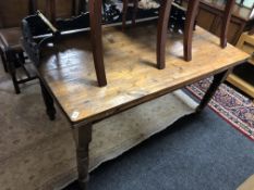 A Victorian pine kitchen table (missing drawer)
