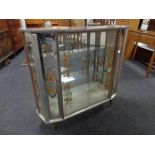 A mid 20th century melamine display cabinet