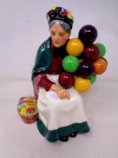 A Royal Doulton figure - The Old Balloon Seller HN 1315