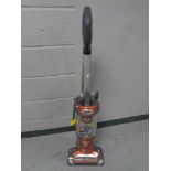 A Shark upright vacuum cleaner