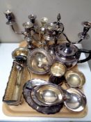 A tray of silver plated wares - candelabrum, gravy boat on stand,