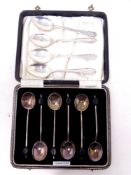 A cased set of six silver coffee spoons,