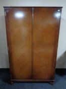 A 20th century Strongbow Furniture mahogany double door wardrobe