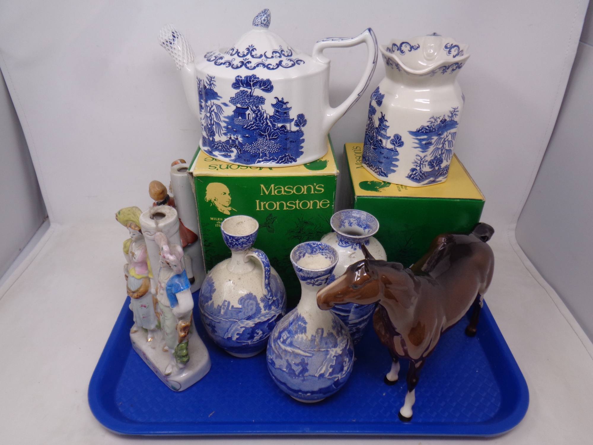 A tray of two boxed Masons for Ringtons blue and white teapot and similar jug,