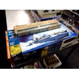 An Airfix 600 scale Queen Elizabeth II model kit together with a Italeri 1:35 scale Vosper MTB 77