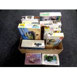 A box of approximately 10 mostly 1:35 scale military modelling kits including Dragon and Zvezda etc