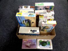 A box of approximately 10 mostly 1:35 scale military modelling kits including Dragon and Zvezda etc