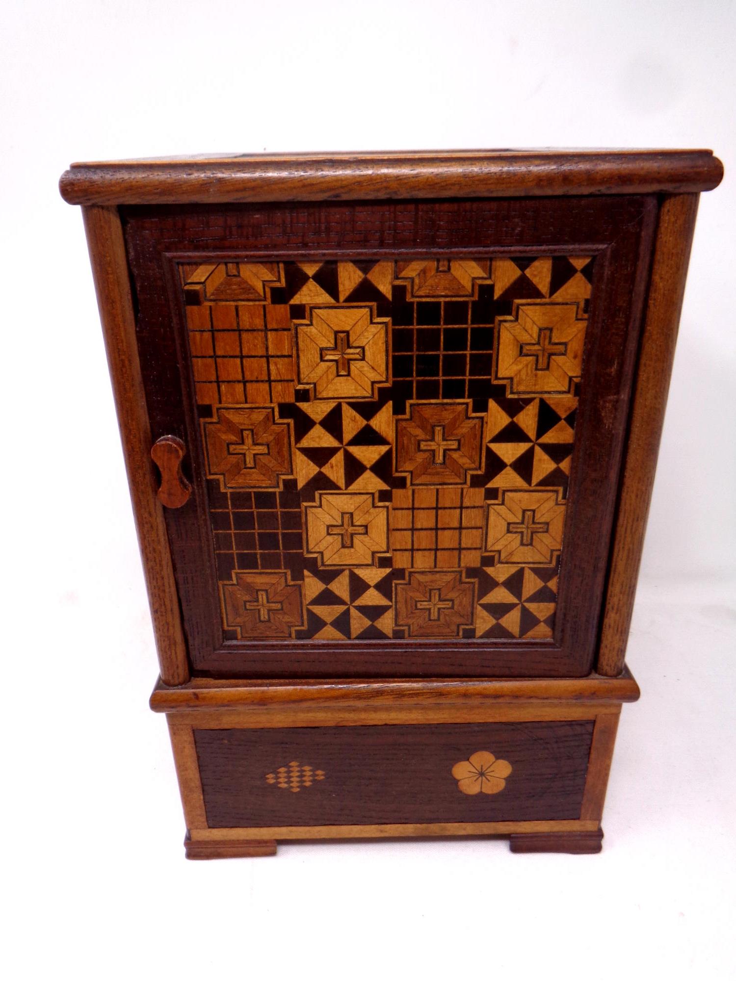 A parquetry smoker's box