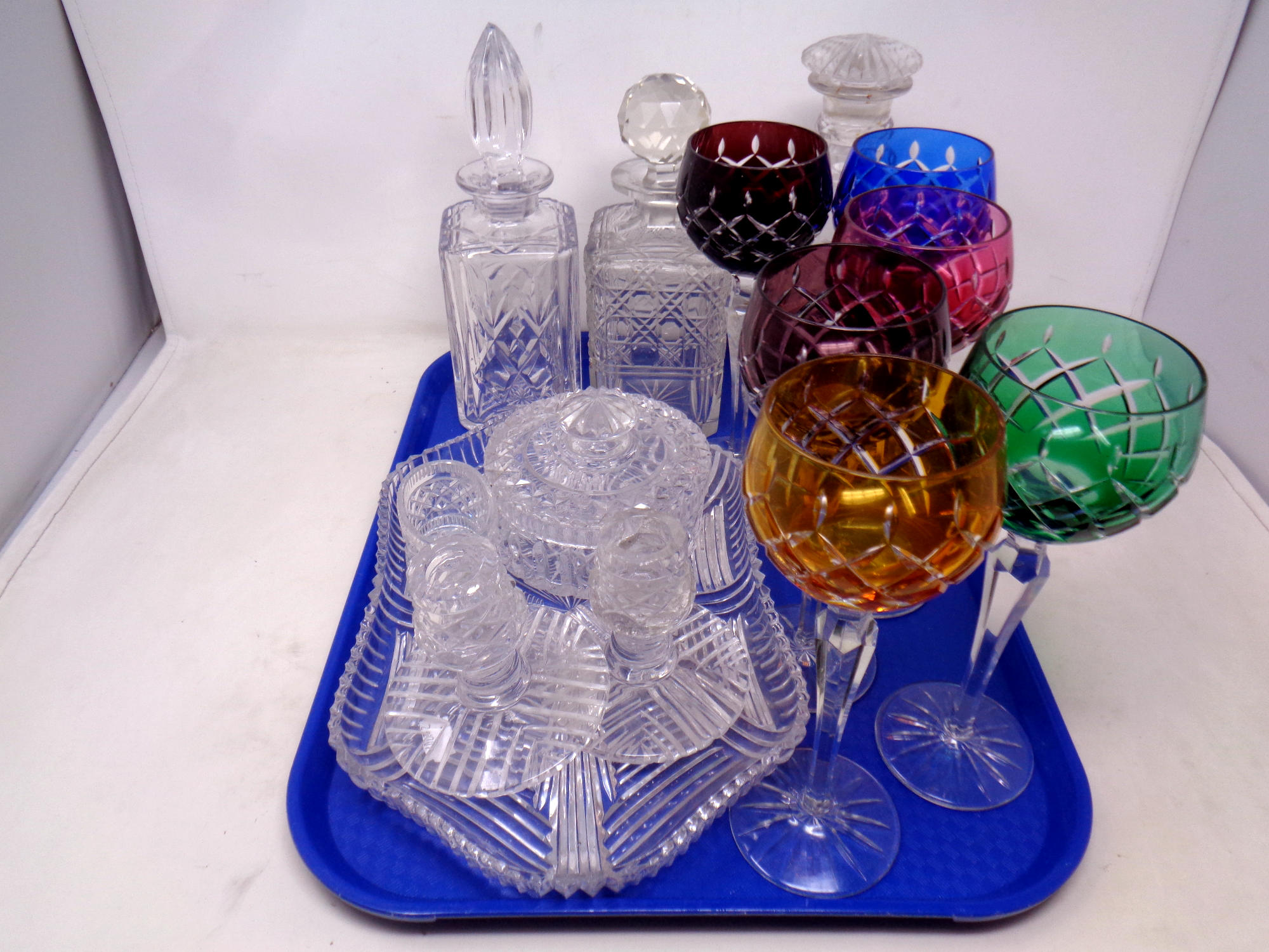 A tray of six coloured wine glasses, dressing table set,