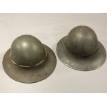 Two Second World War tin helmets