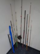 A bundle of assorted fishing rods and a Scarborough fishing reel