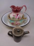 An enamelled kitchen bowl and a 19th century chamber pot,