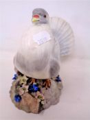 A Royal Crown Derby figure of a fan tail pigeon