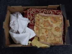 A box of cushion covers, linen,