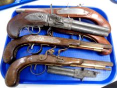 A tray of six replica flintlock pistols