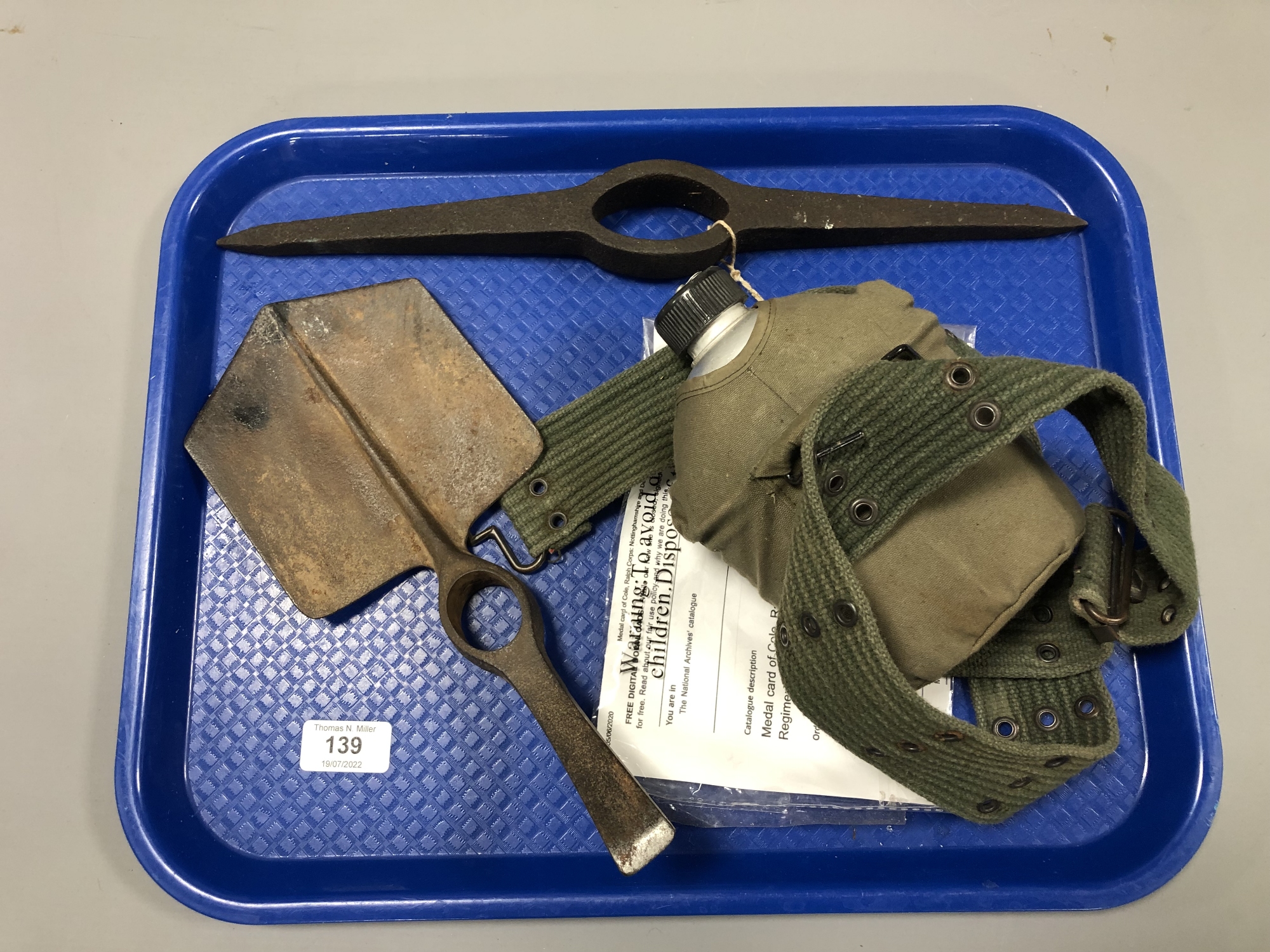 A military entrenching tool head,