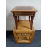 An oak two tier lamp table and an occasional table
