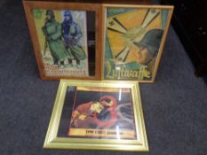 Three framed WWII style propaganda posters
