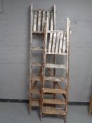 Two sets of wooden folding steps