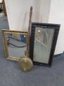 An antique brass wooden handled bed warming pan and two mirrors