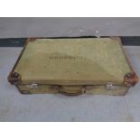 A vintage canvas luggage case