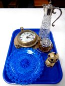 A tray of enamelled egg table ornament, brass ship's clock,