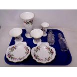 A tray of two small cut glass decanters with stoppers and a quantity of Wedgwood Hathaway rose